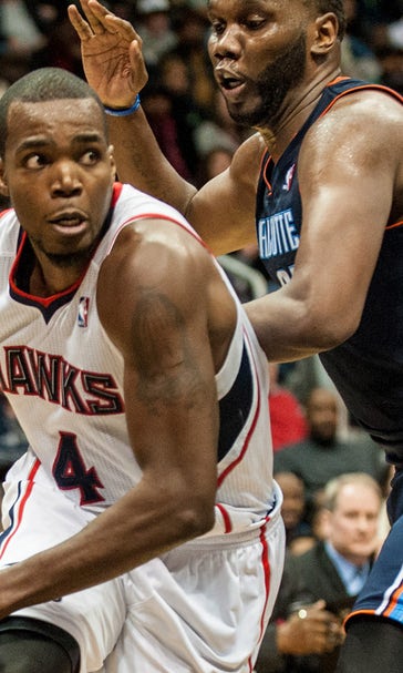 Hawks outlast Love, Wolves; 100-point streak hits 8